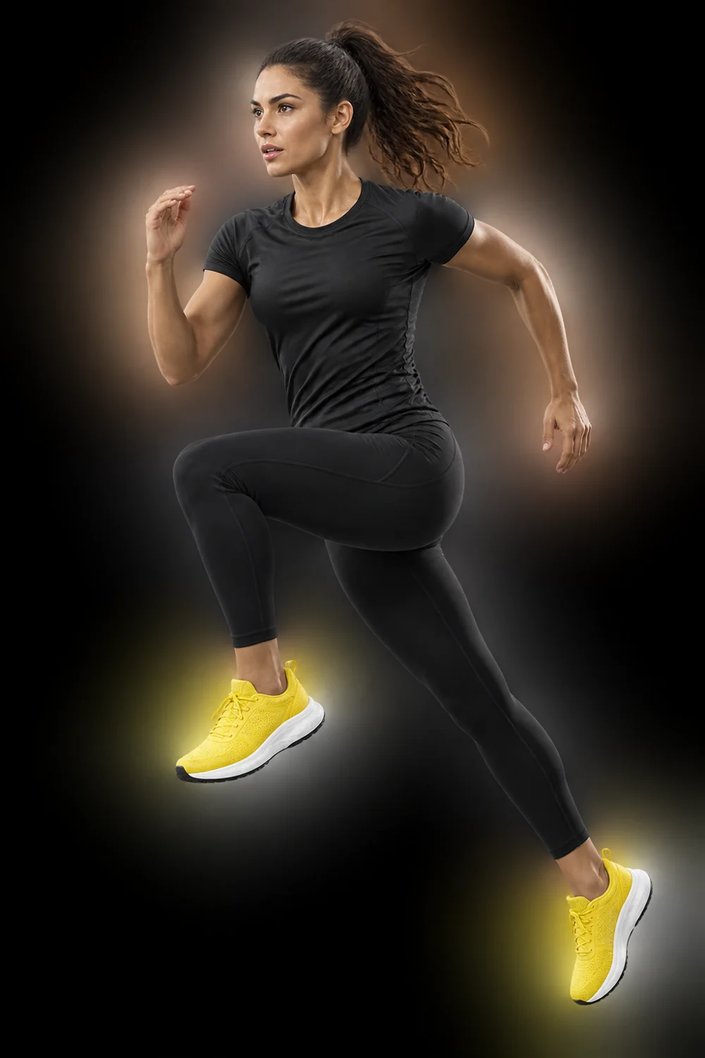 Athlete running in dark training clothes and yellow shoes